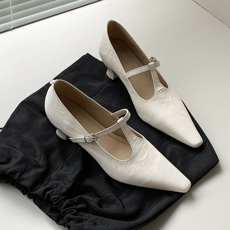 White Pointed-toe Pumps