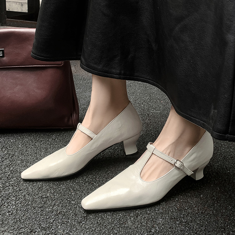 White Pointed-toe Pumps
