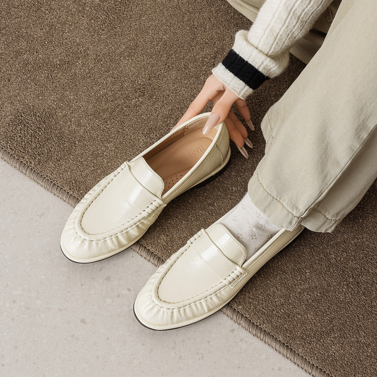 Cream Round-toe loafers