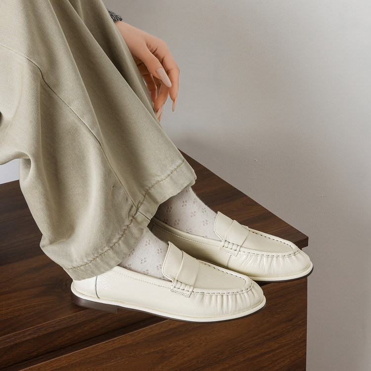 Cream Round-toe loafers