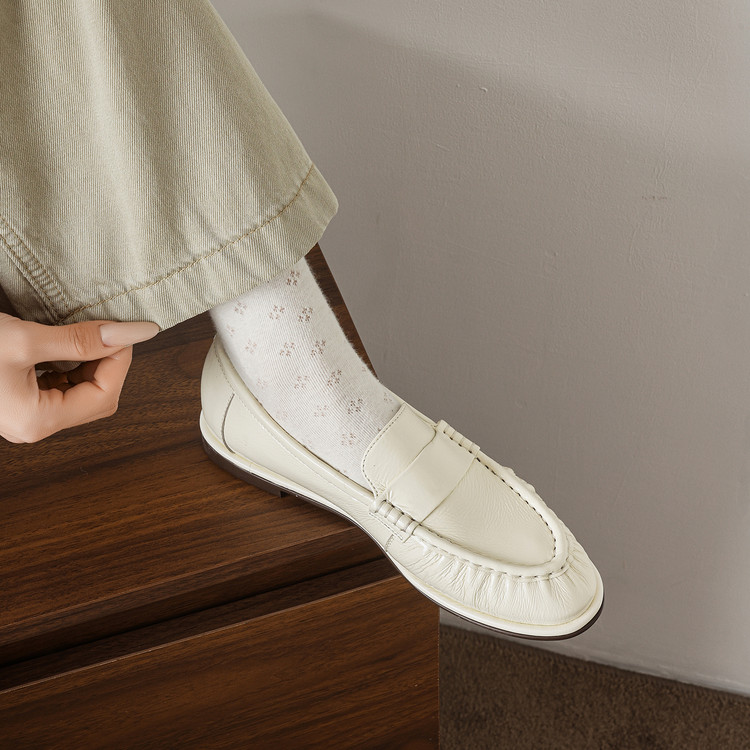 Cream Round-toe loafers